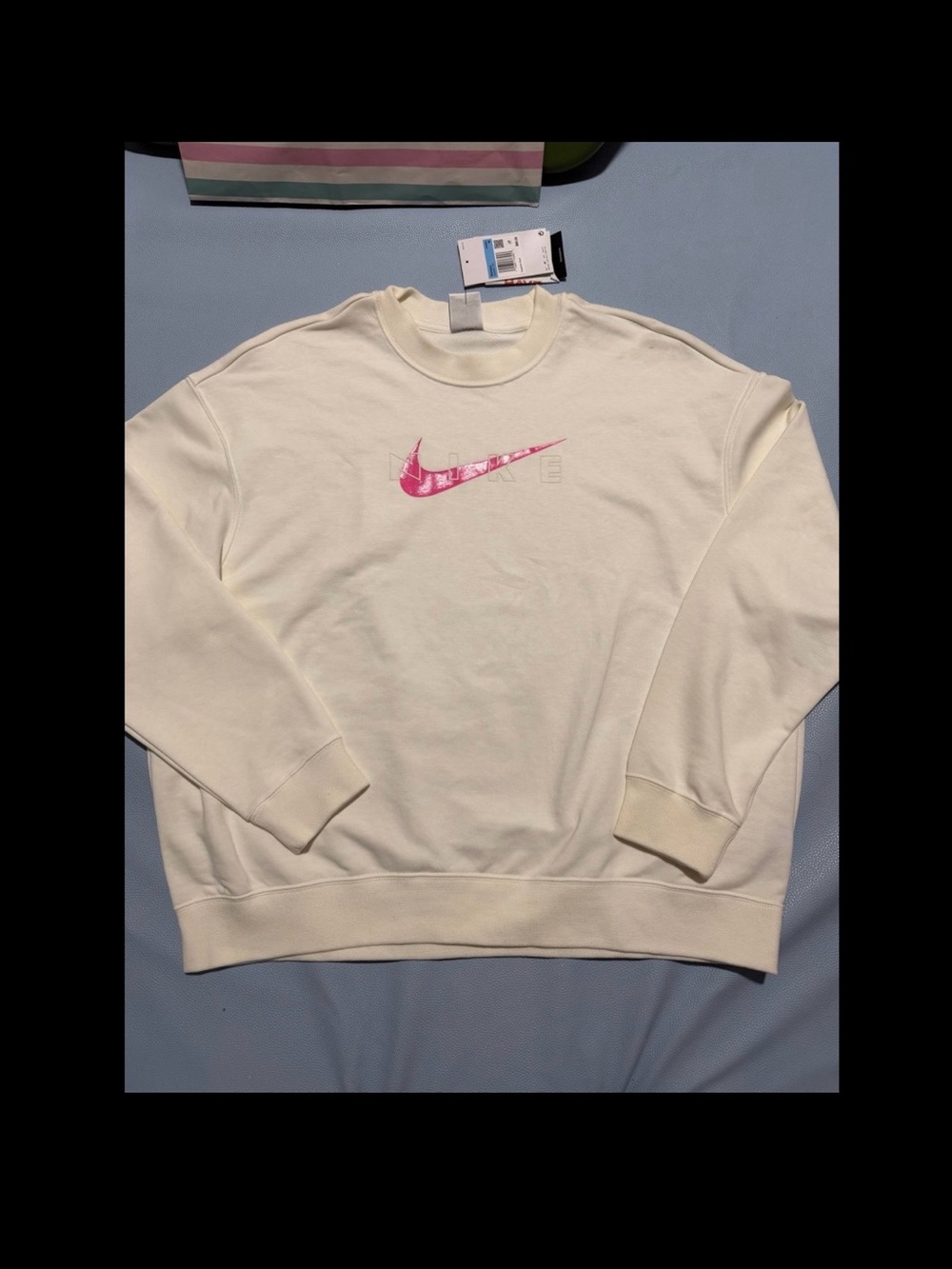 Nike Women's Cream Crewneck with Pink Swoosh Graphic